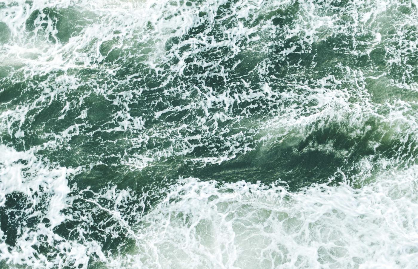 A group of engineers working in a high-tech facility.